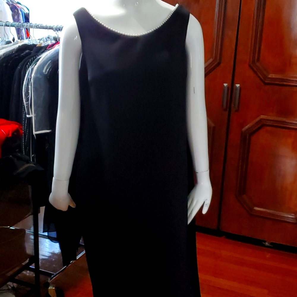 Calvin Klein dress black with pearl around the neck, size 14.